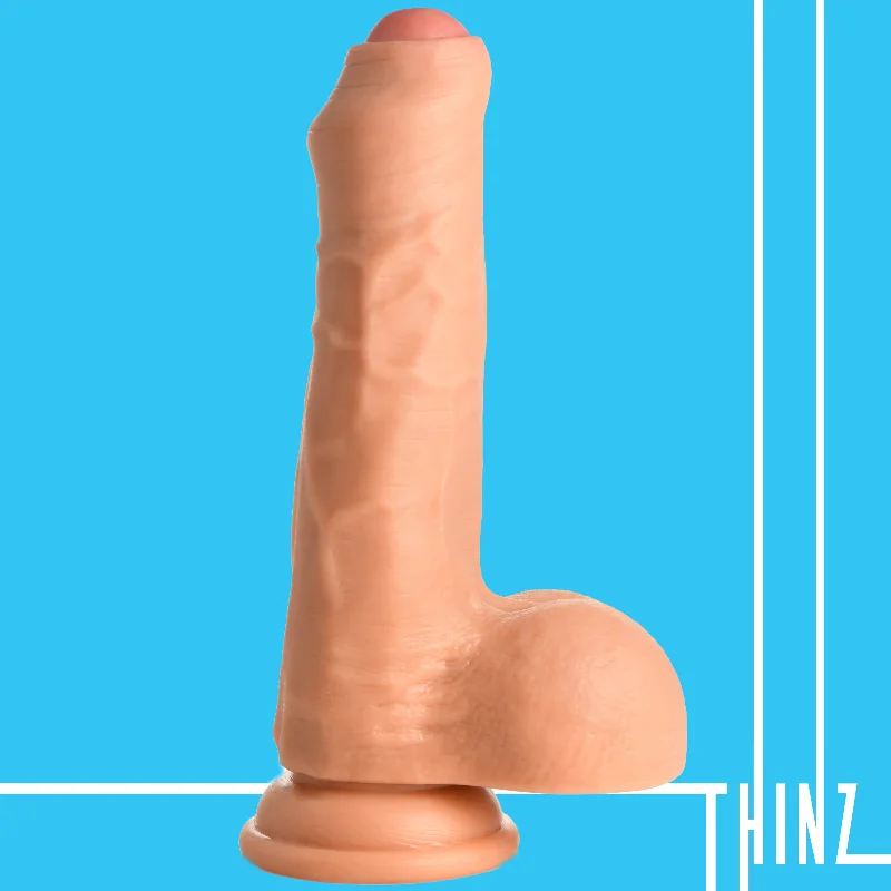 black affordable dildo-7 Inch Uncut Dildo With Balls